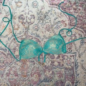 Luli fama Size M, padded top in teal/turquoise lace over lay.